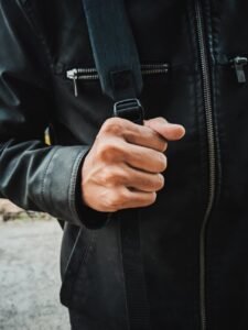 a man in black leather jacket